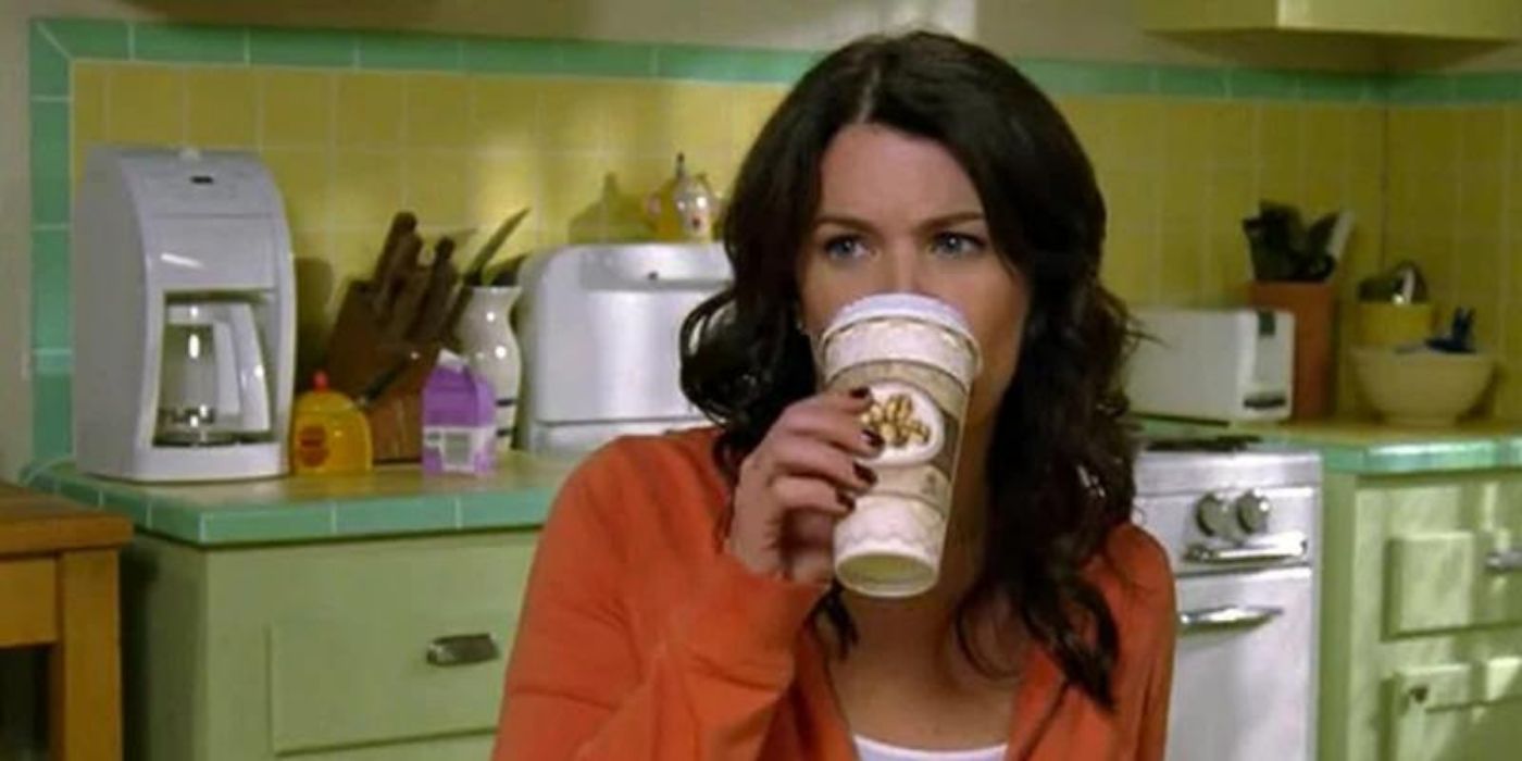 Lorelai drinking Luke's coffee at home in Gilmore Girls