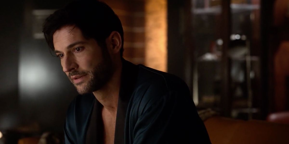 Lucifer sitting and talking to Eve wearing a bathrobe in Lucifer.
