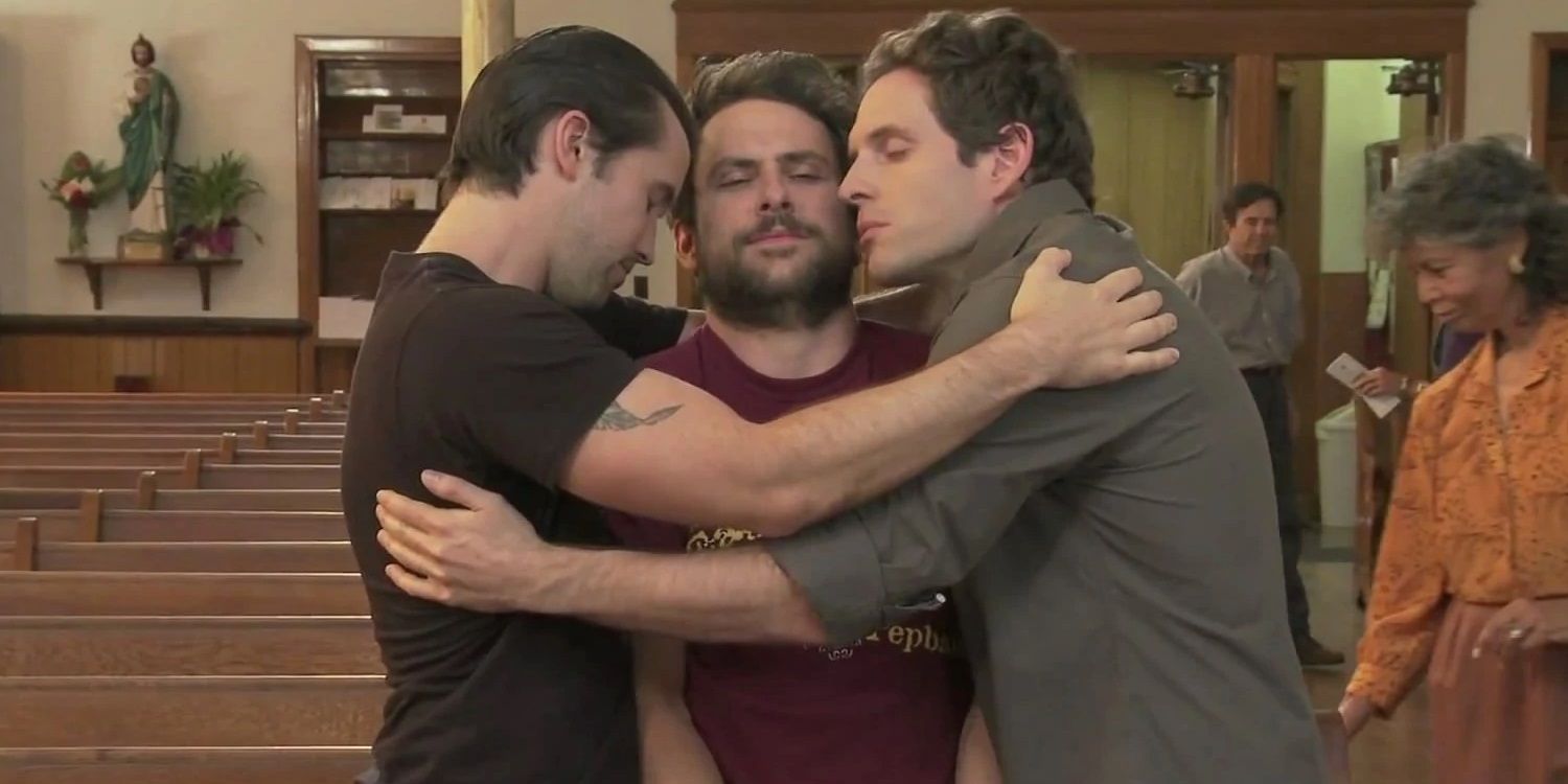 Mac and Dennis hug Charlie in It's Always Sunny