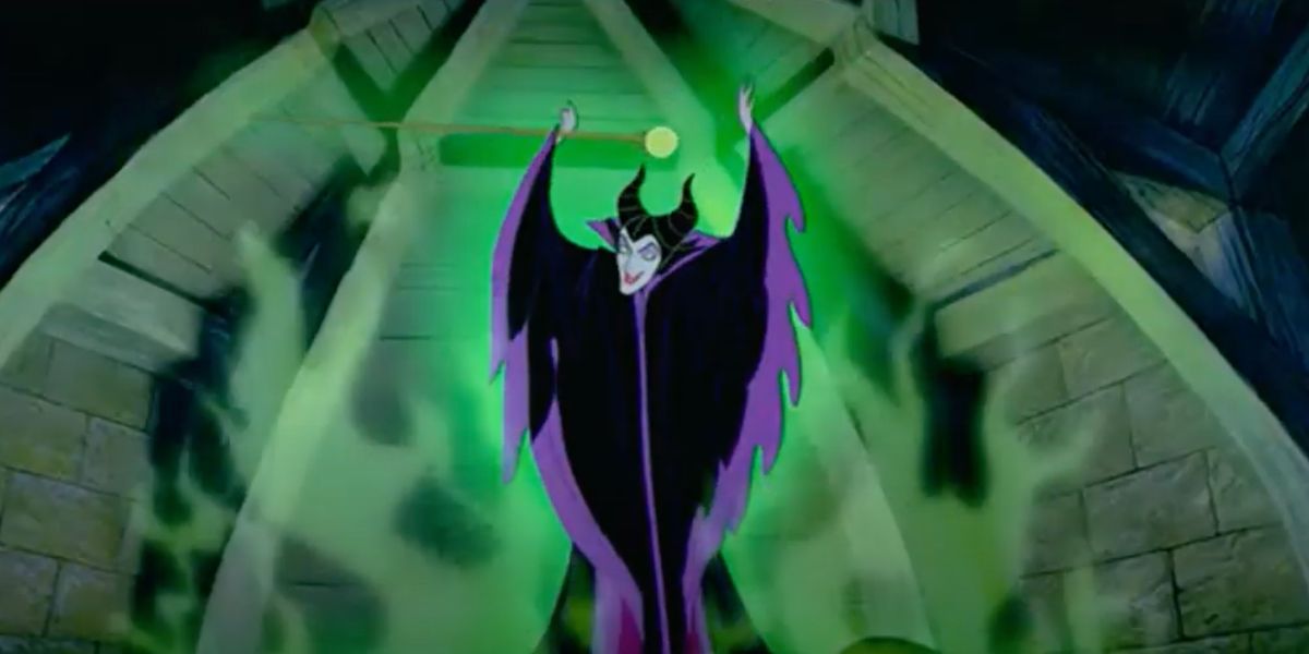 Maleficent laughing with green light and smoke in Sleeping Beauty.