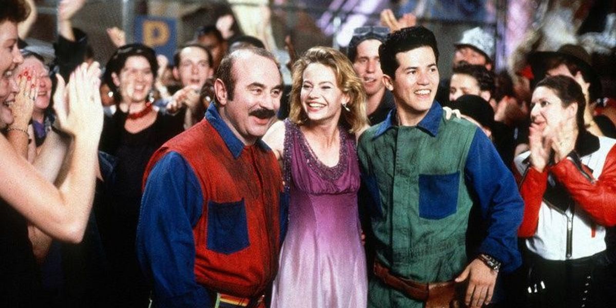 Mario, Luigi, and Daisy celebrating the victory over Koopa in Super Mario Bros. 1993