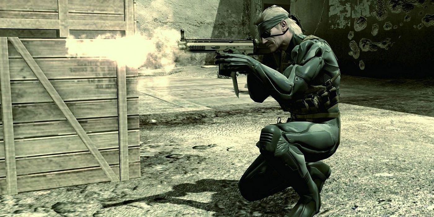 An aged Solid Snake firing a machine gun