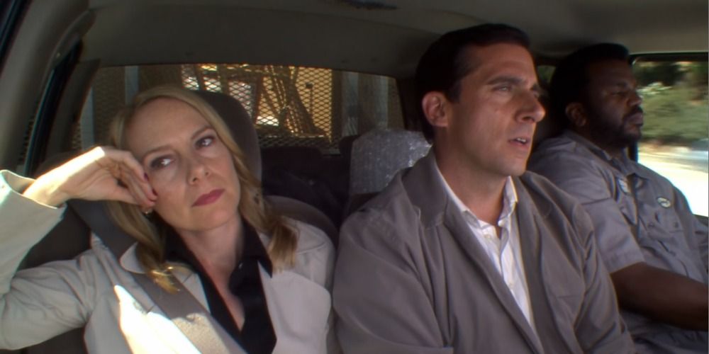 Michael, Holly, and Darryl from The Office in a moving van