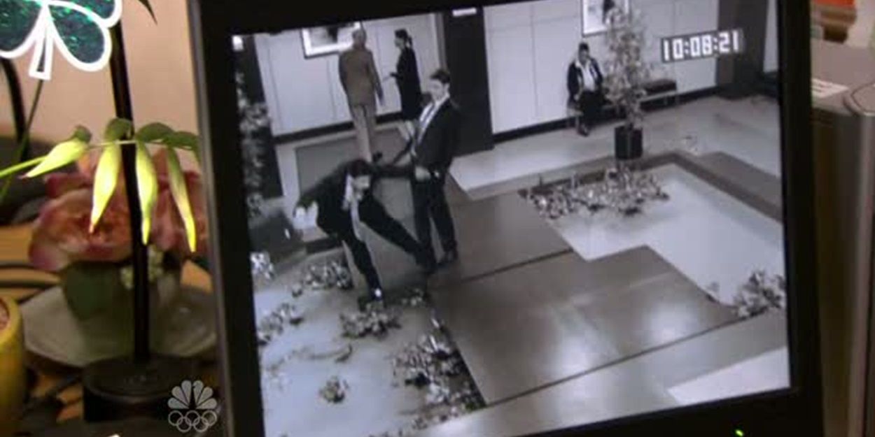 Michael falls in a koi pond in The Office