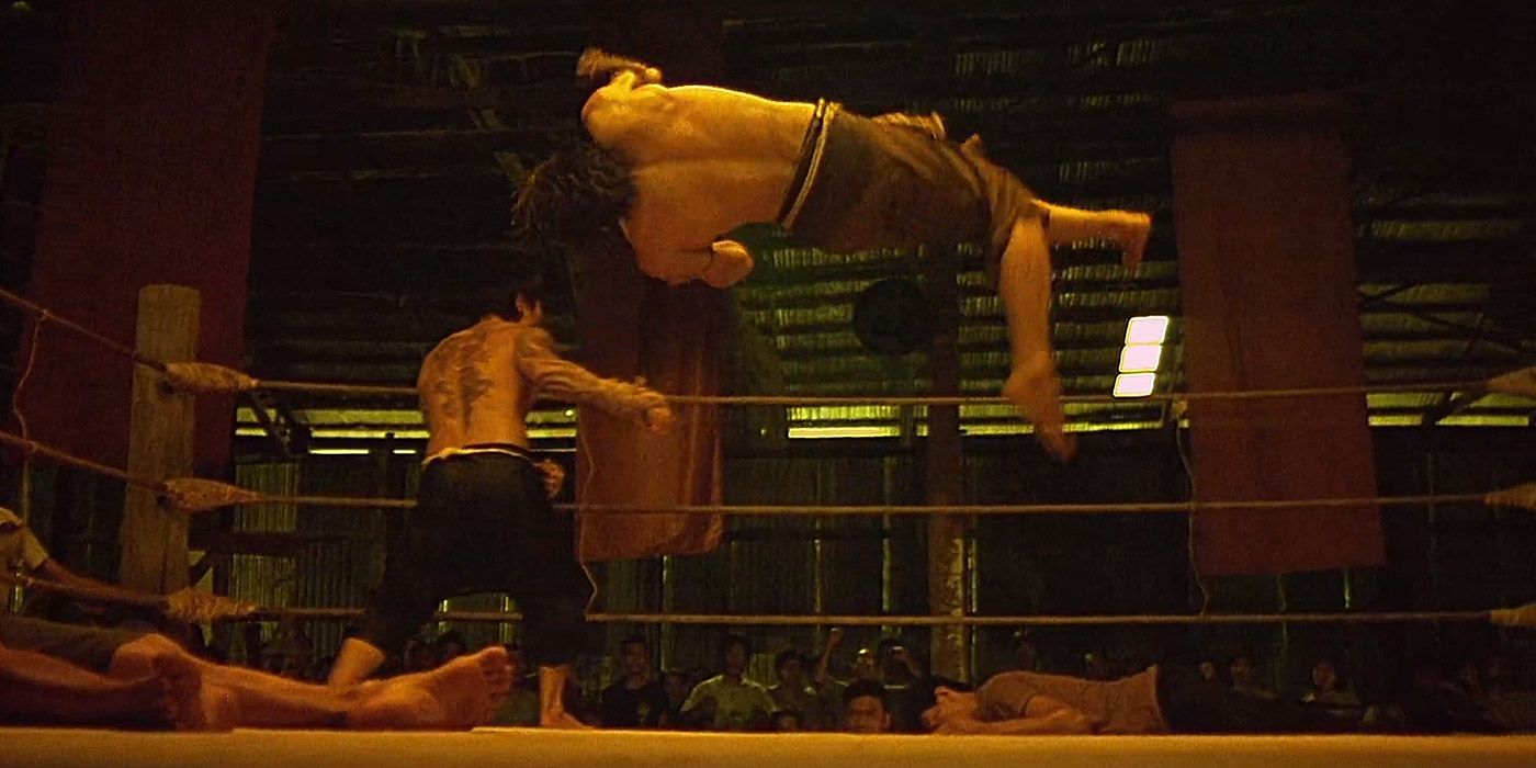 Ting gets clotheslined by Saming in the ring
