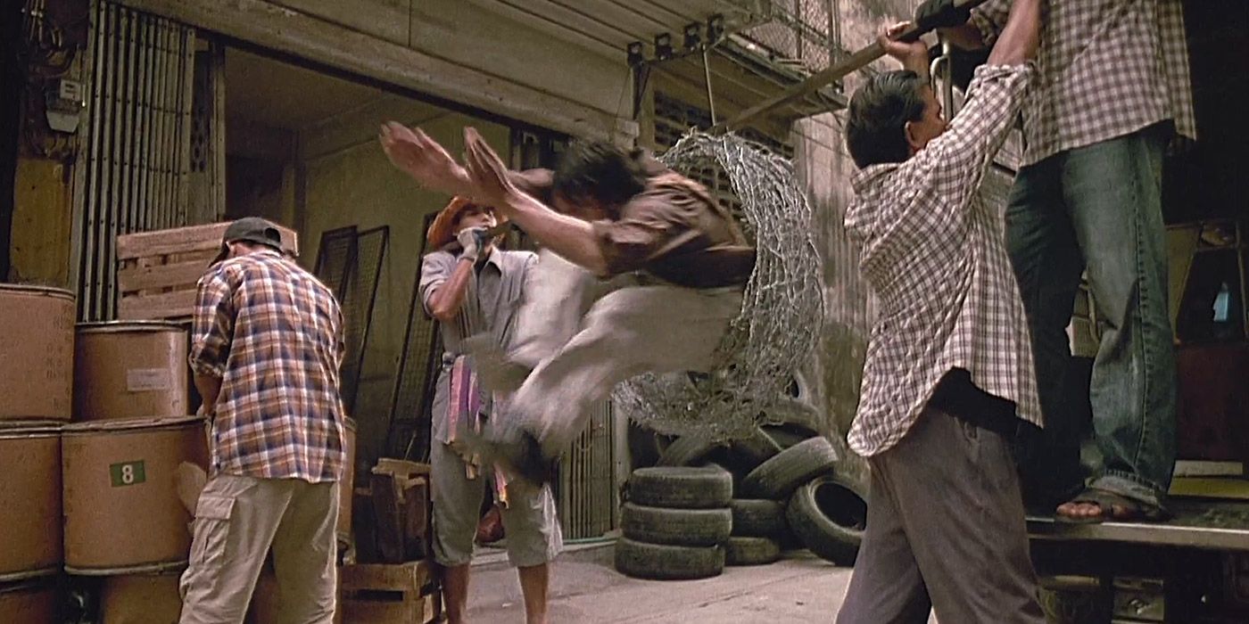 Ting leaps through a coil of barbed wire in Ong Bak