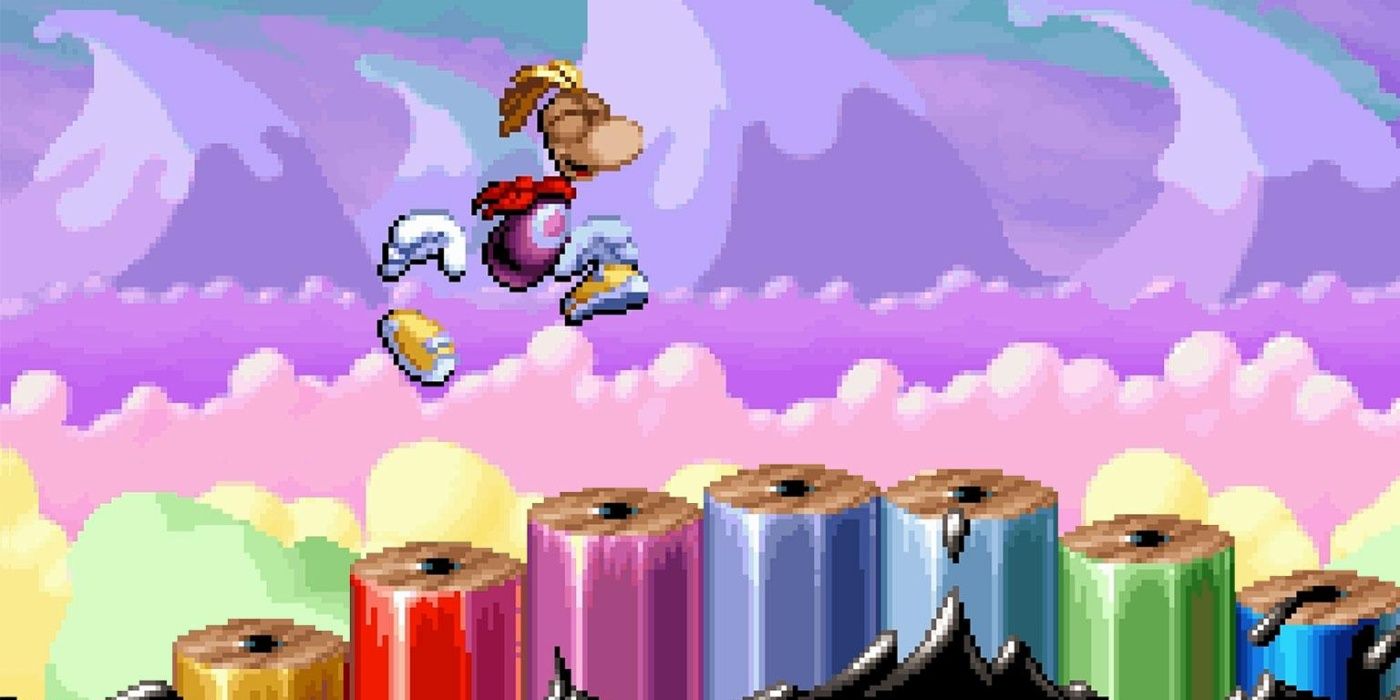 Rayman jumps over a brightly colored landscape in Rayman 