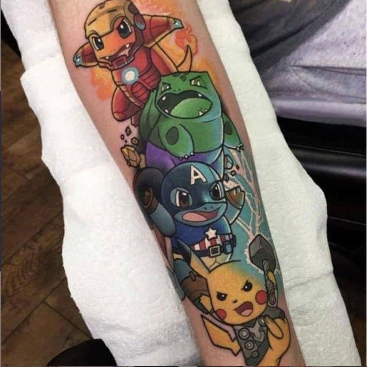 Tattoo of Generation 1 starter Pokemon and Pikachu as the Avengers