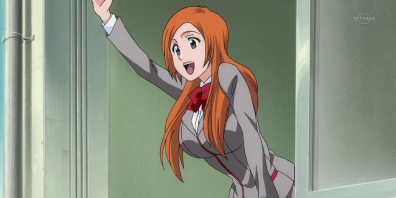 Orihime Inoue waving and smiling in Bleach