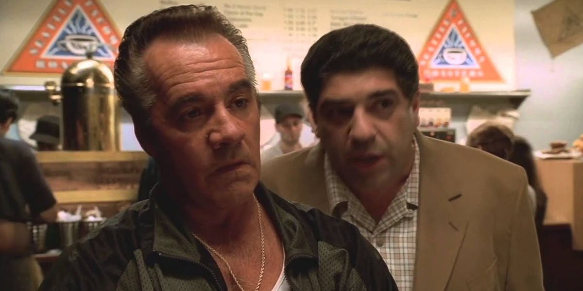 Paulie standing at a coffee shop counter in The Sopranos