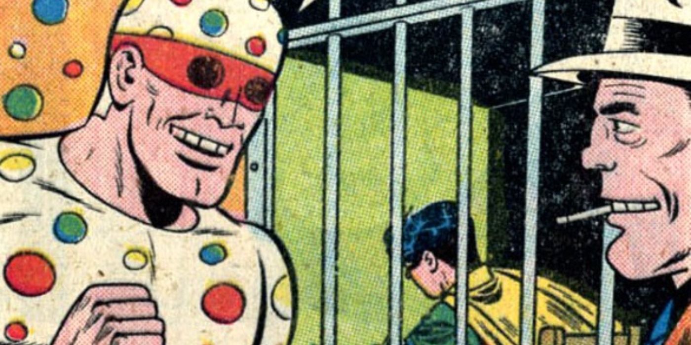 Polka Dot Man captures Robin in DC Comics.