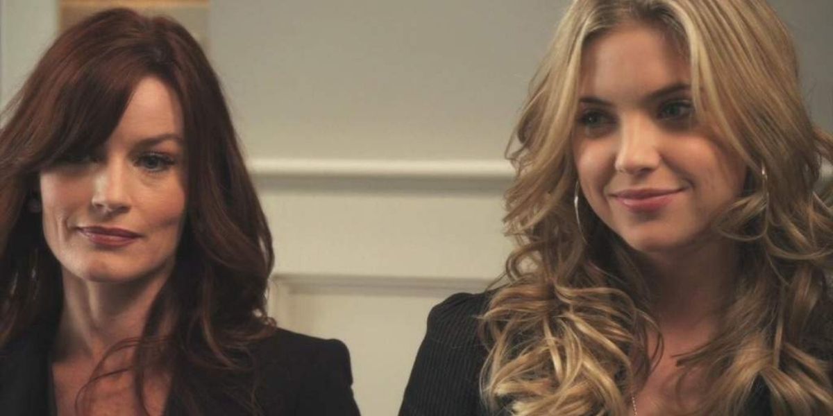 Hanna and Ashley stand side by side and smile