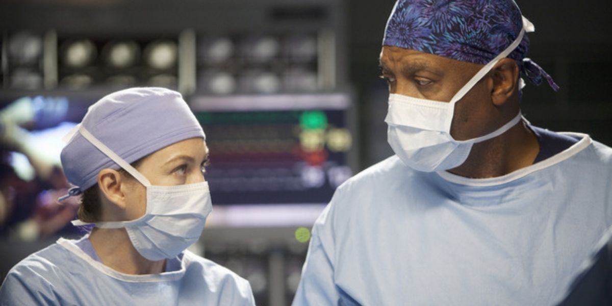 Richard and Meredith looking at each other while operating