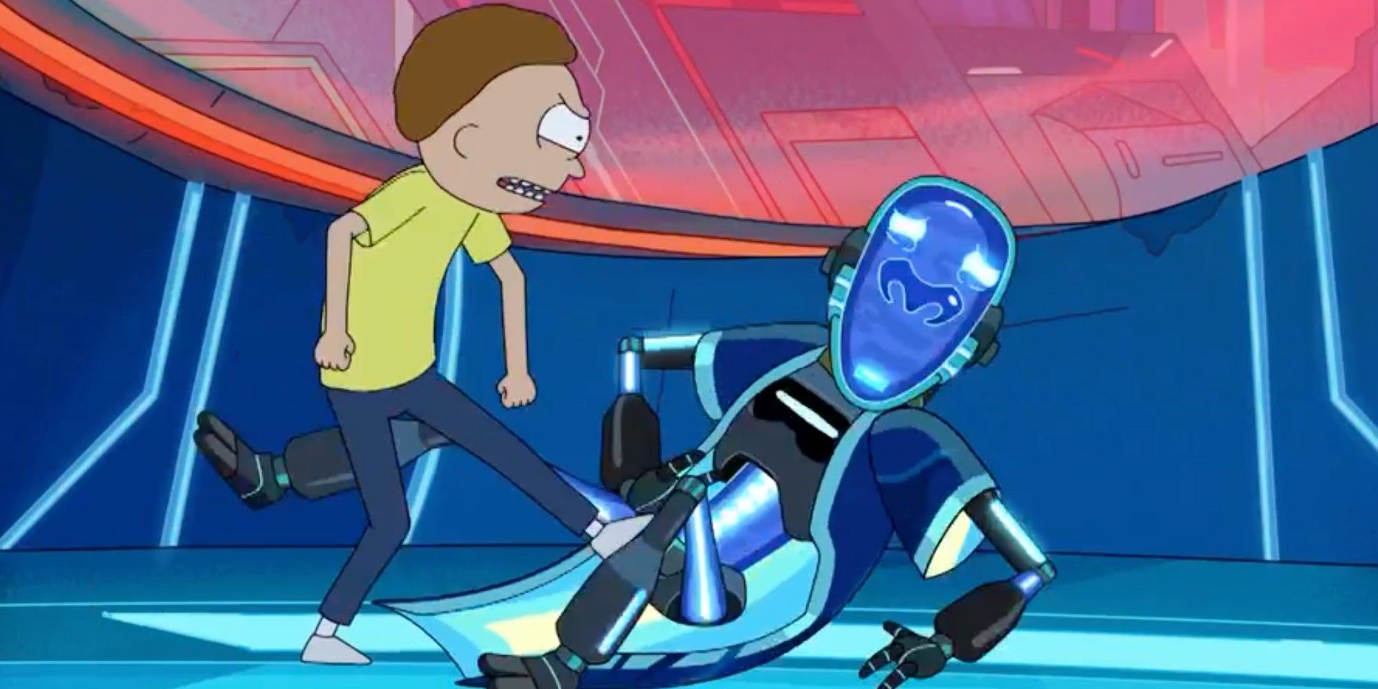 Morty angrily kicks a fallen robot in Rick & Morty