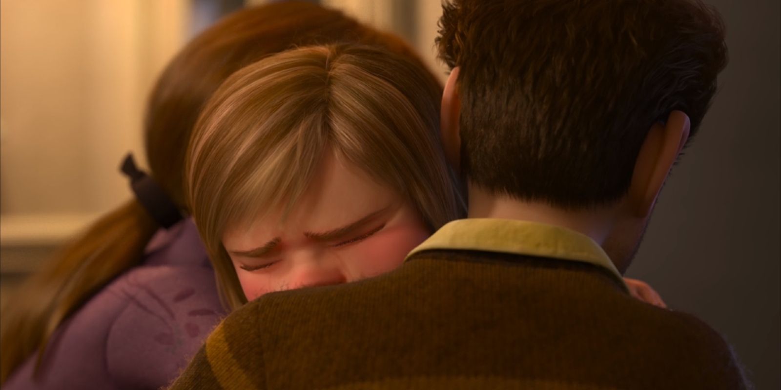 Riley crying into her parents in Inside Out