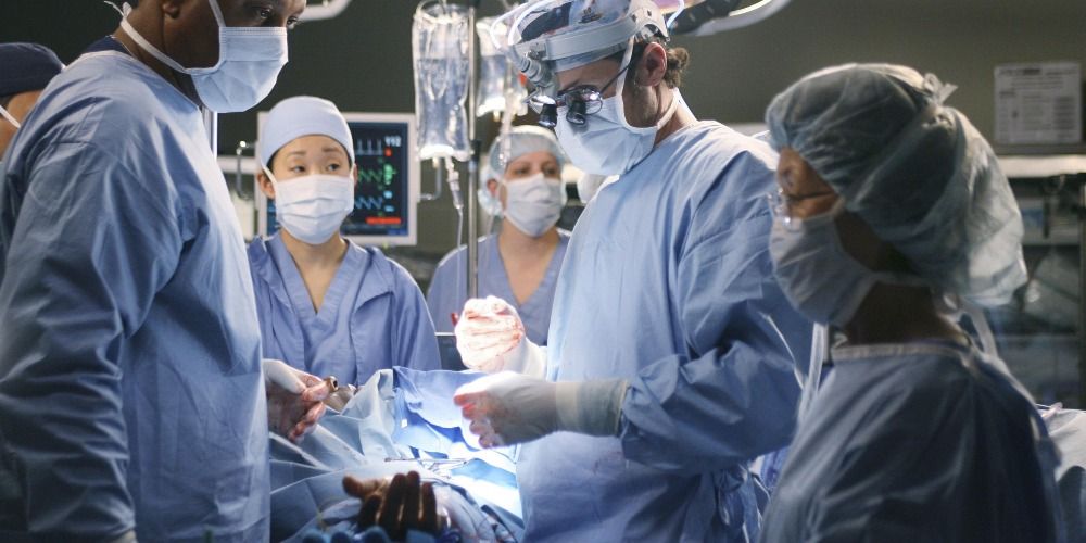 From left: Dr. Richard Webber, Dr. Cristina Yang. and Dr. Derek Shepherd operate on a patient in Grey's Anatomy.