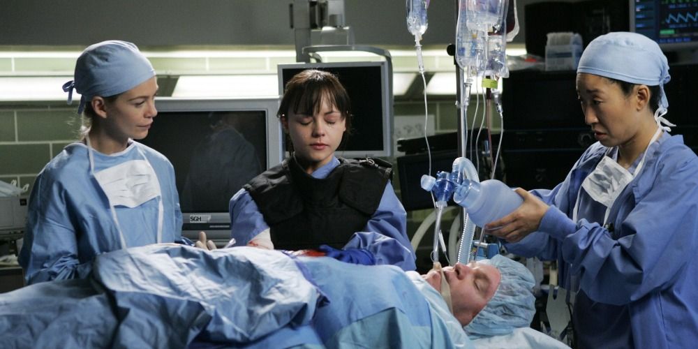 From left: Dr. Meredith Grey, Hannah Davies, and Dr. Cristina Yang deal with a bomb inside a patient in Grey's Anatomy.