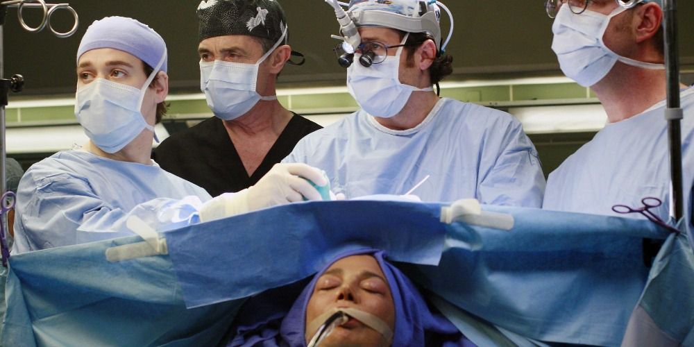 From left: Dr. George O'Malley, Dr. Colin Marlow, and Dr. Derek Shepherd look quizzically during a neurosurgery in Grey's Anatomy.