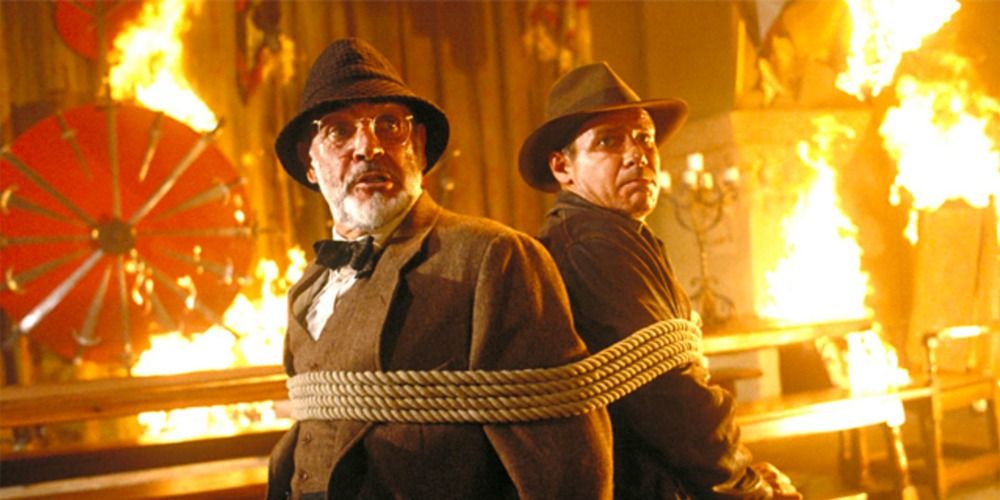 Sean Connery and Harrison Ford tied up in a fire in Indiana Jones and the Last Crusade (1989)
