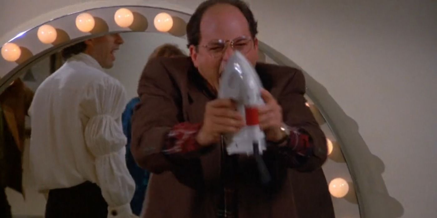George's career as a hand model comes to an end when he grabs an iron in Seinfeld