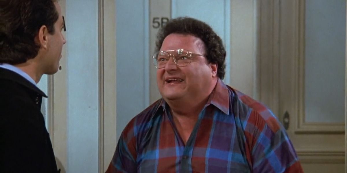 Newman standing in Jerry's doorway in Seinfeld