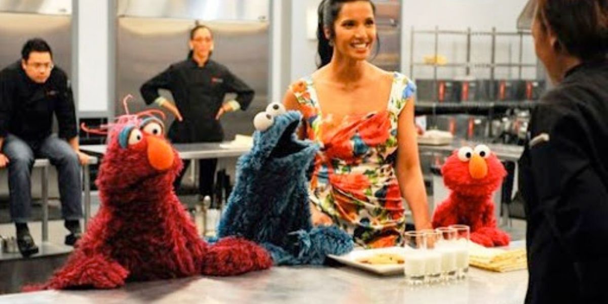 Telly, Cookie Monster, and Elmo with Padma Lakshmi and a chef