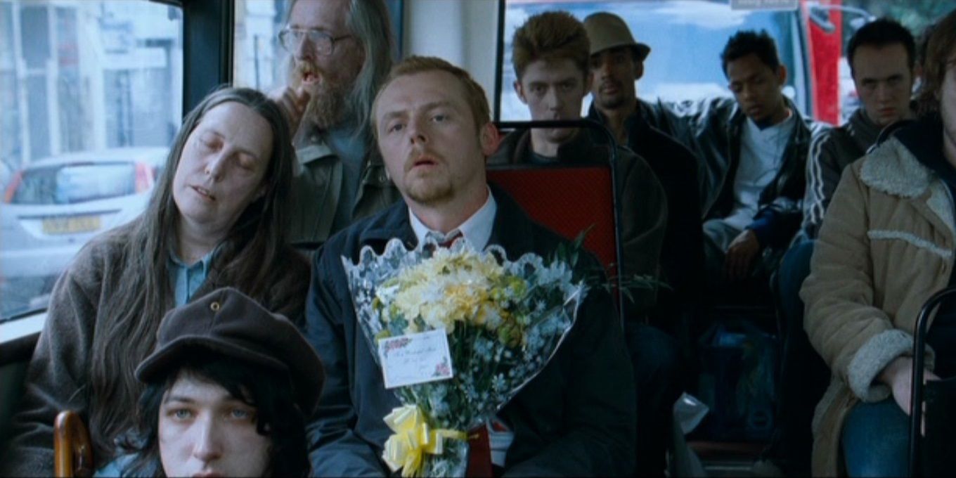 Shaun sits on the bus in Shaun of the Dead