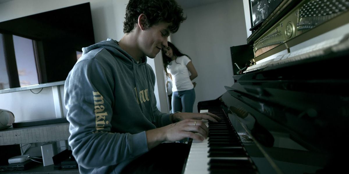 Shawn Mendes playing piano in apartment in Shawn Mendes: In Wonder