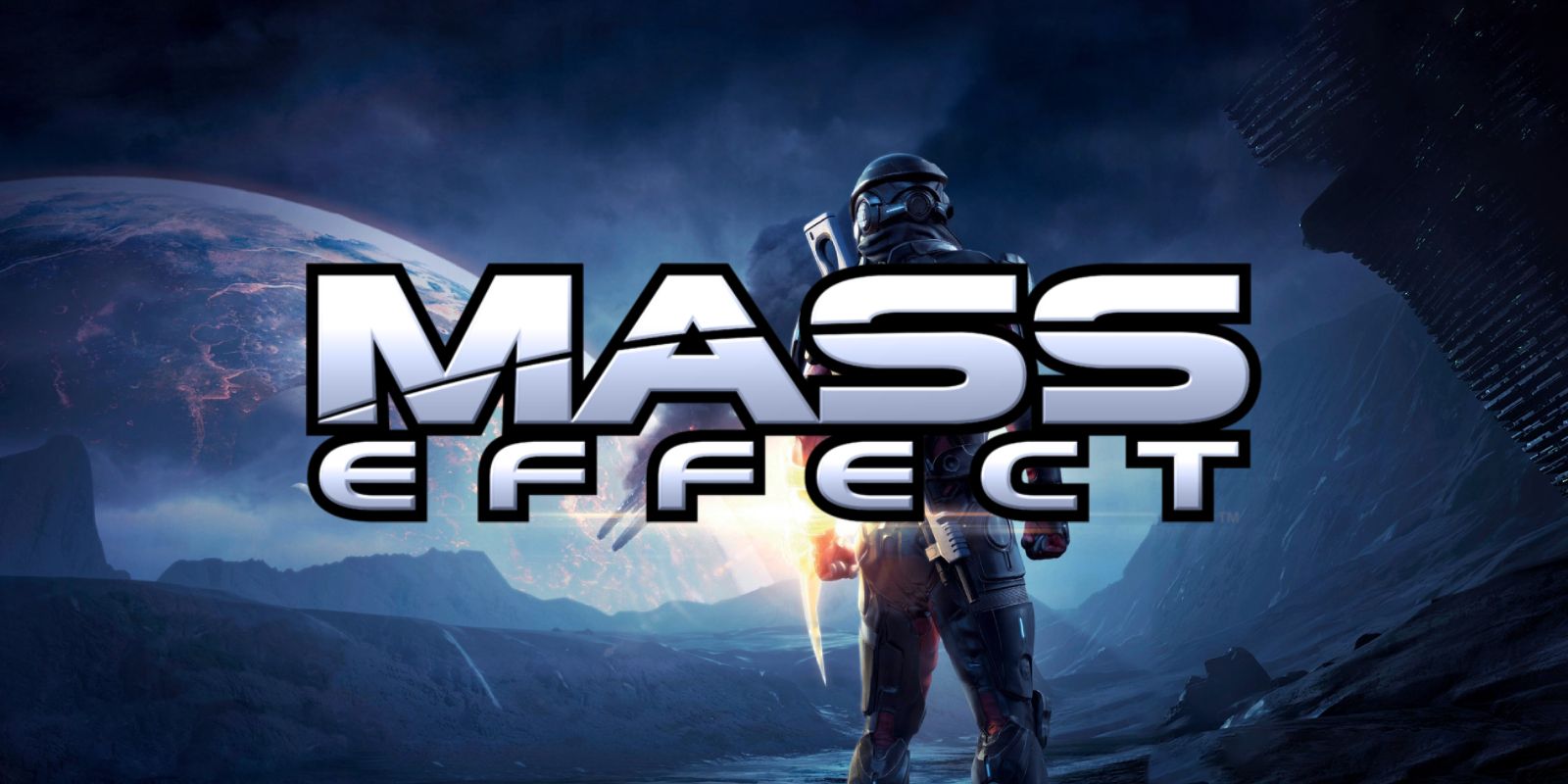 Sherpherd stands in full view of a planet in the horizon behind the Mass Effect logo.