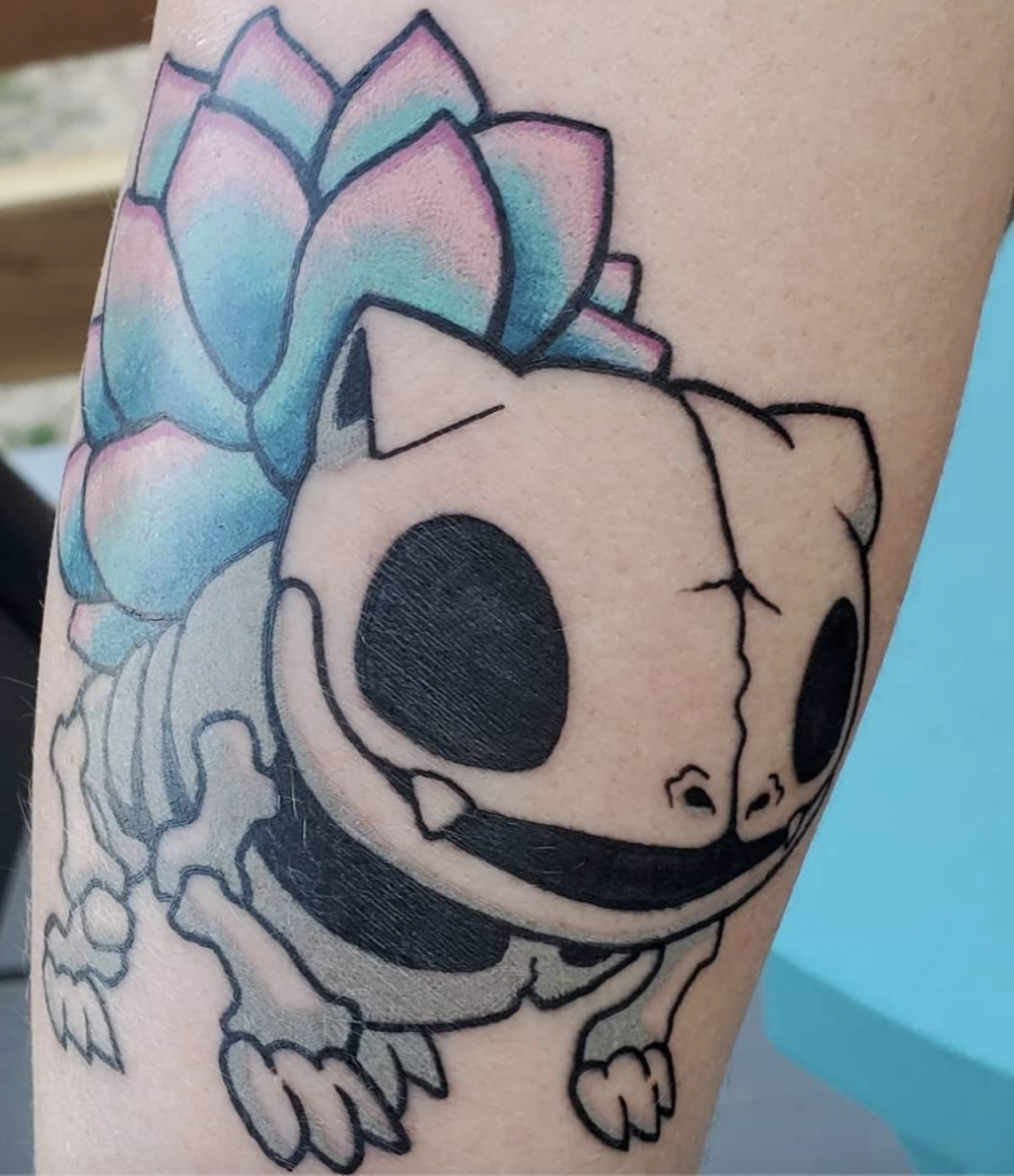 Tattoo of Bulbasaur as skeleton with a succulent pod