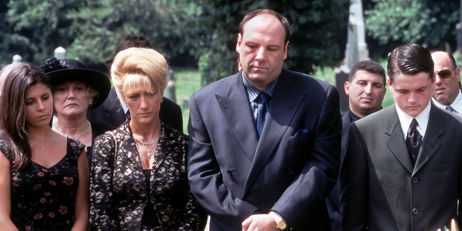 Characters of The Sopranos stand at a funeral