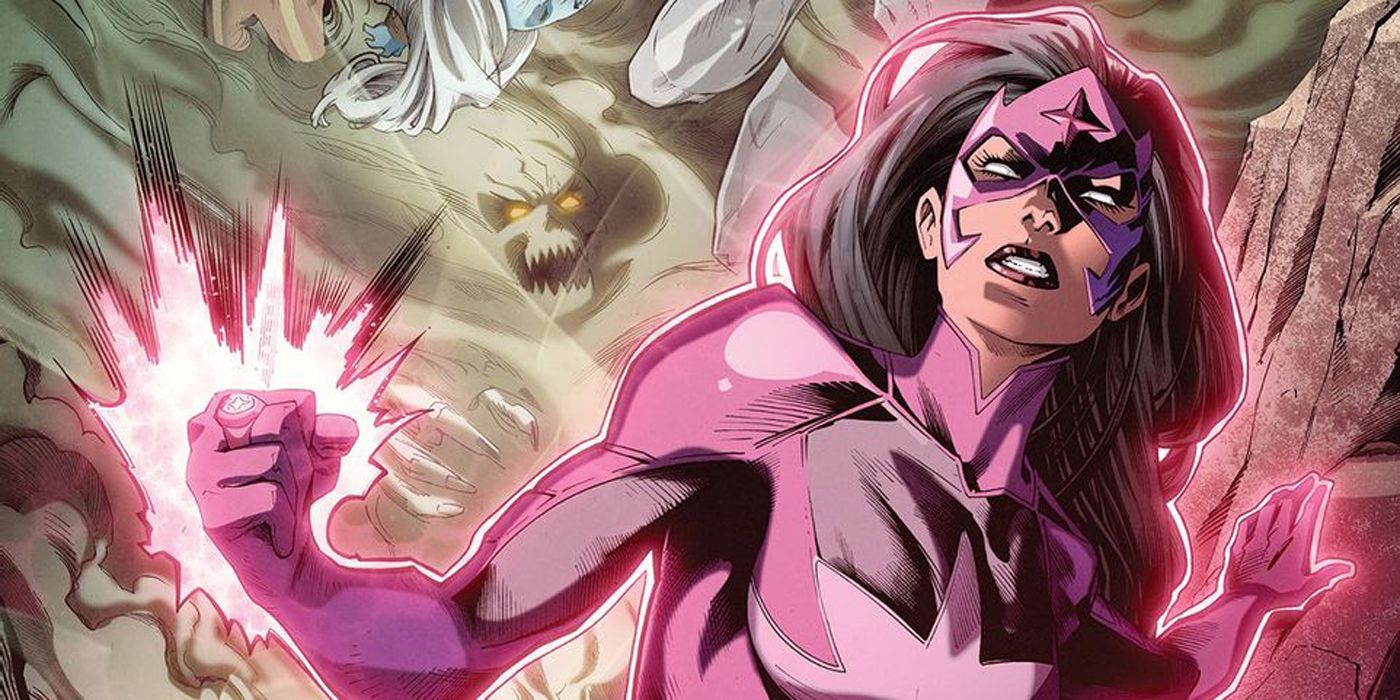 Star Sapphire clenches her fist with pink energy surrounding her in a DC comic.