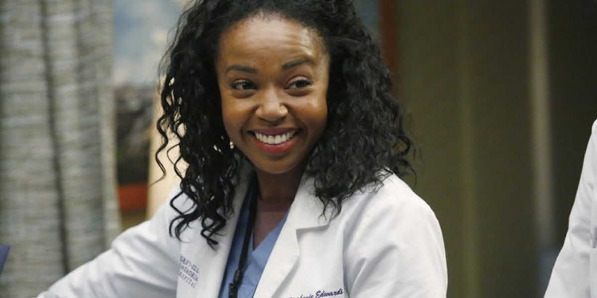 Stephanie Edwards from Grey's Anatomy smiling at someone off camera