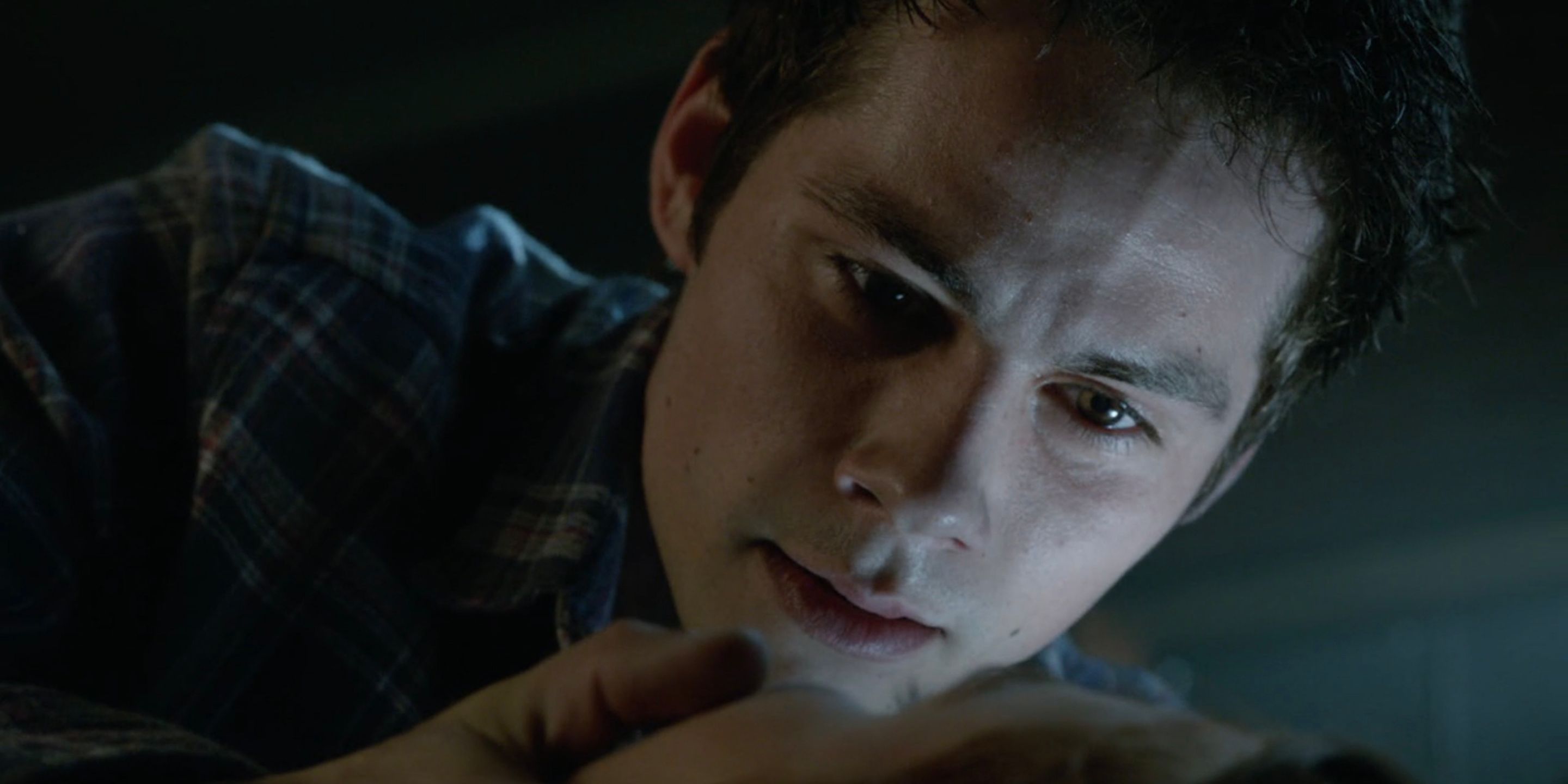 Stiles begs Lydia to wake up in Teen Wolf.