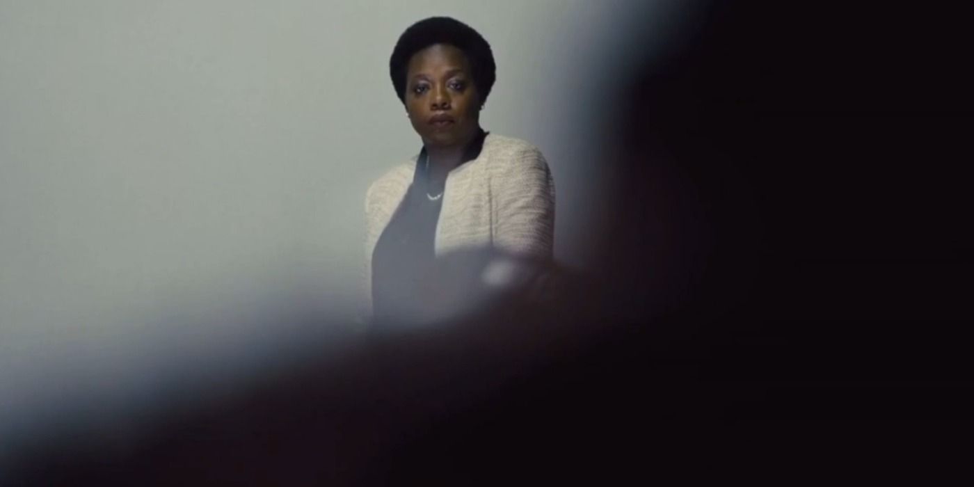 Amanda Waller doing a presentation in The Suicide Squad