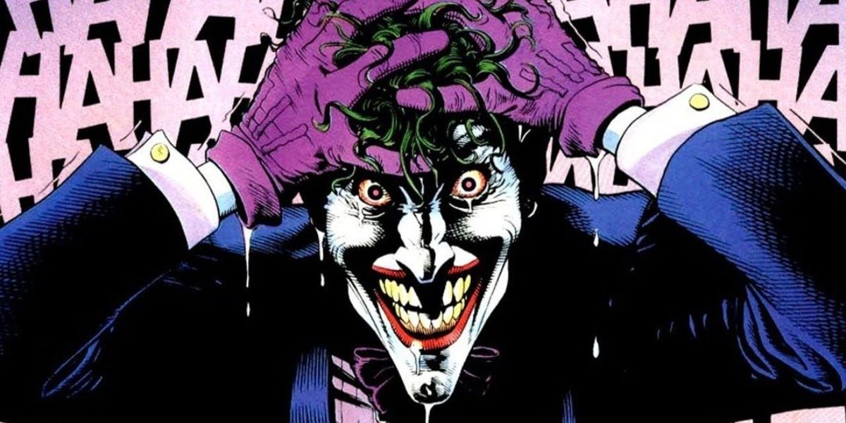 The Joker laughing maniacally with tears streaming down his face.