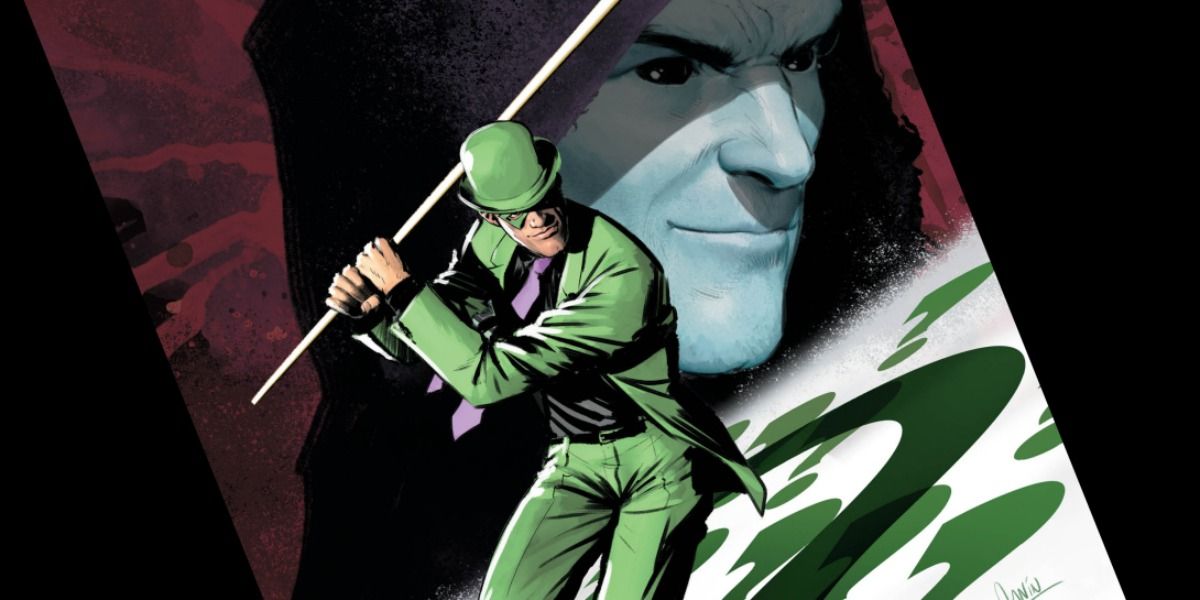 The Riddler prepares his cane as he stands on a tilted Riddler card, a sinister figure lurking in the background.