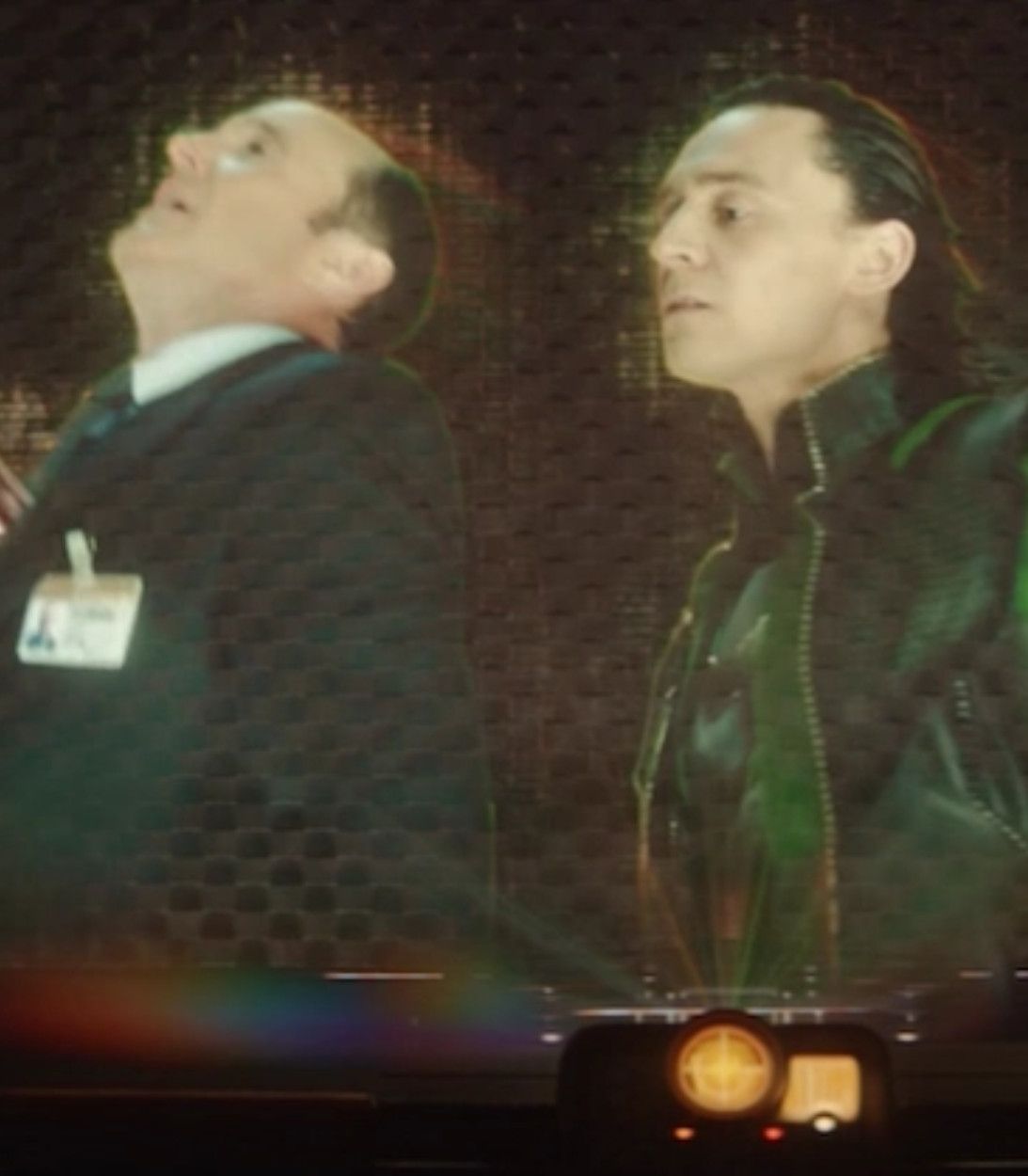 Tom Hiddleston as Loki, Clark Gregg as Agent Phil Coulson in The Avengers Vertical