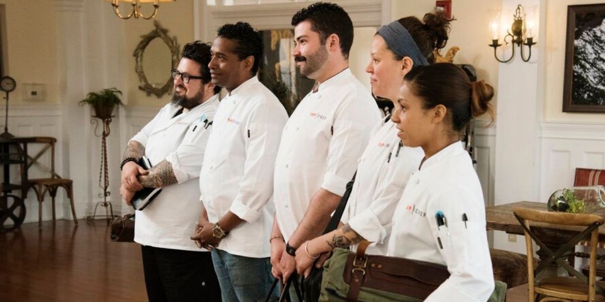 Four chefs stand in line at the Stanely Hotel