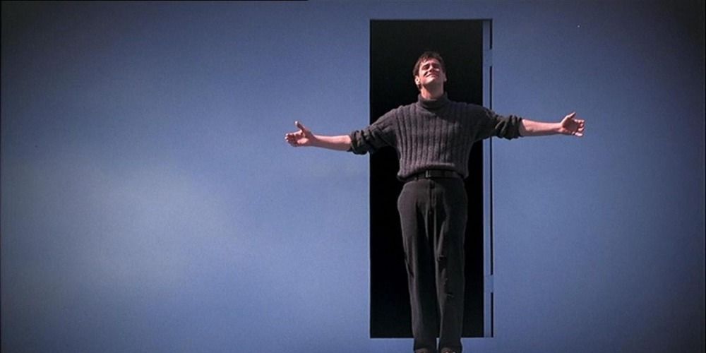 Truman stands at the edge of Seahaven in The Truman Show