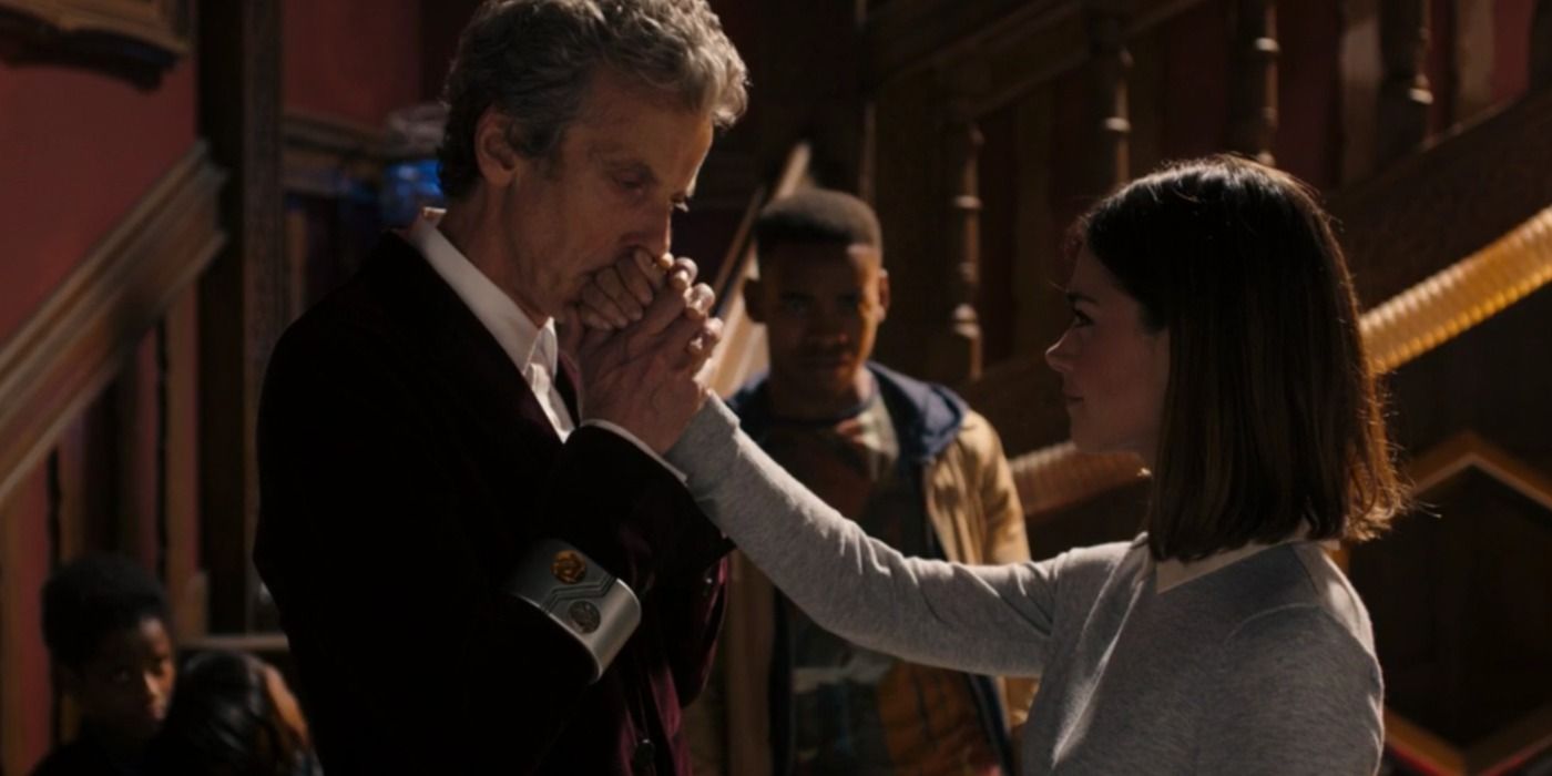 The Twelfth Doctor kisses Clara's hand in Doctor Who