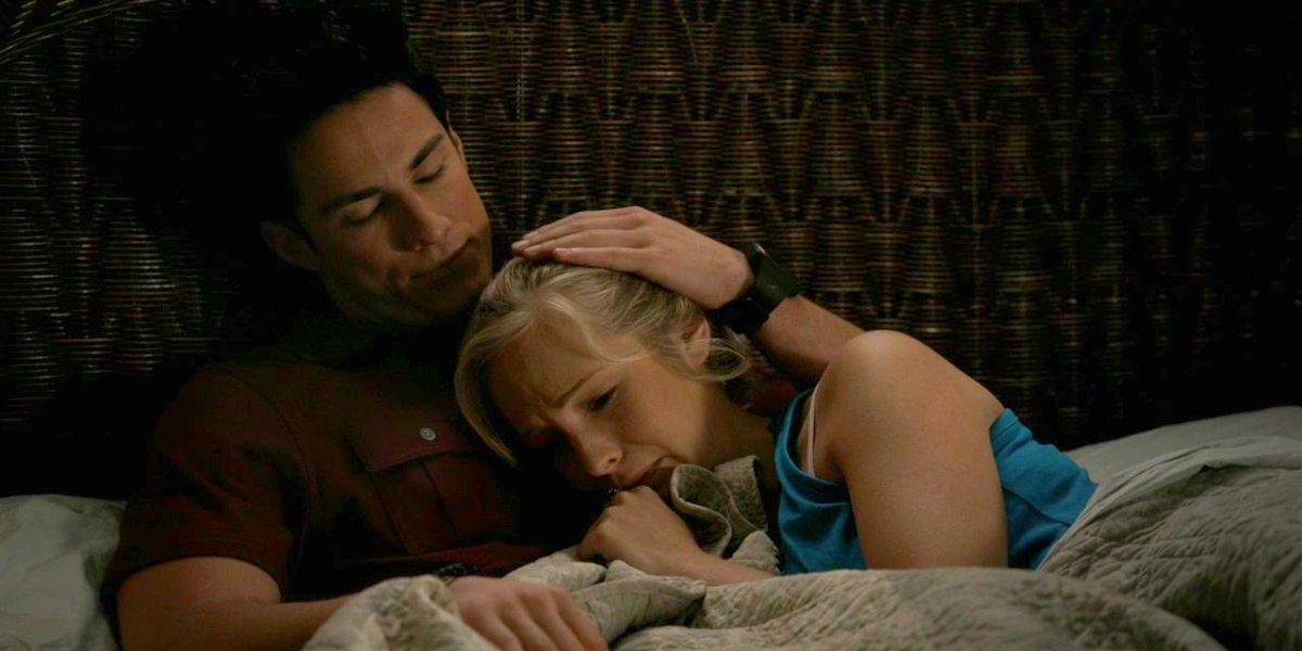 Caroline crying in Tyler's lap in The Vampire Diaries