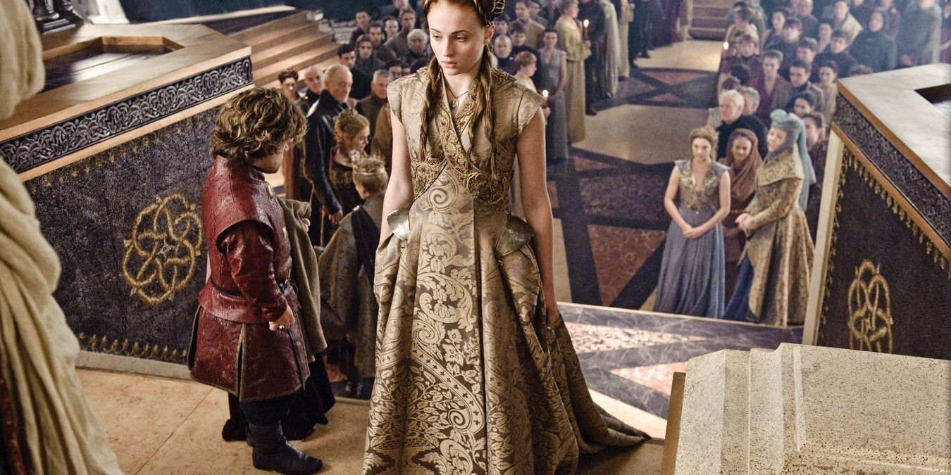 Tyrion and Sansa standing about to get married at Kings Landing