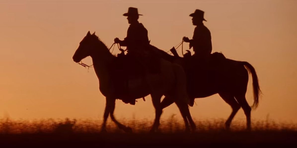 A silhouette of two riders in Unforgiven