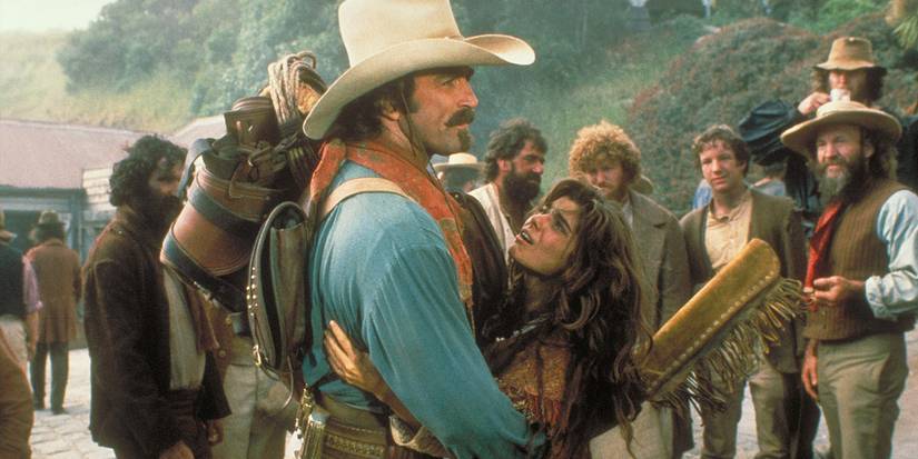 Matthew Quigley (Tom Selleck) holding up Crazy Cora (Laura San Giacomo) in Quigley Down Under