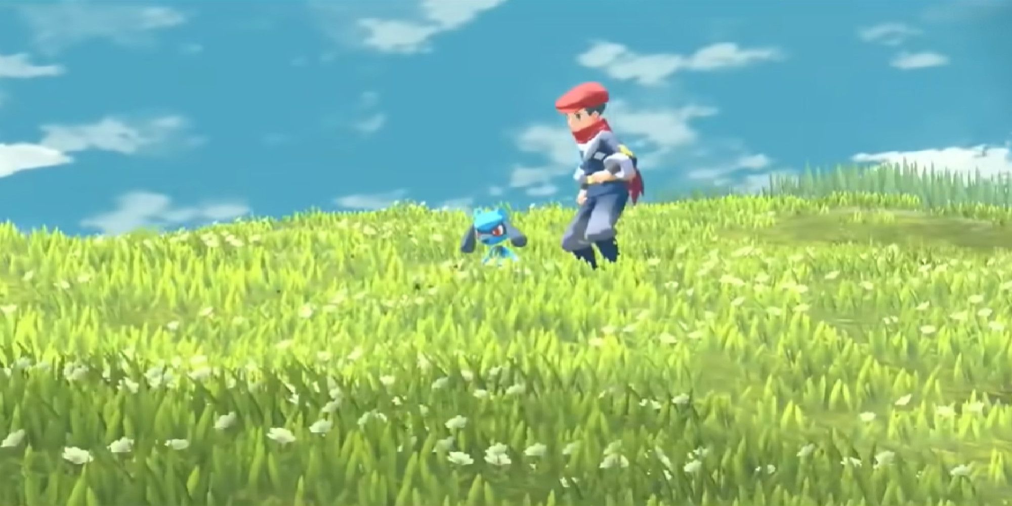 Rei and Riolu standing in tall grass in Pokémon Legends: Arceus