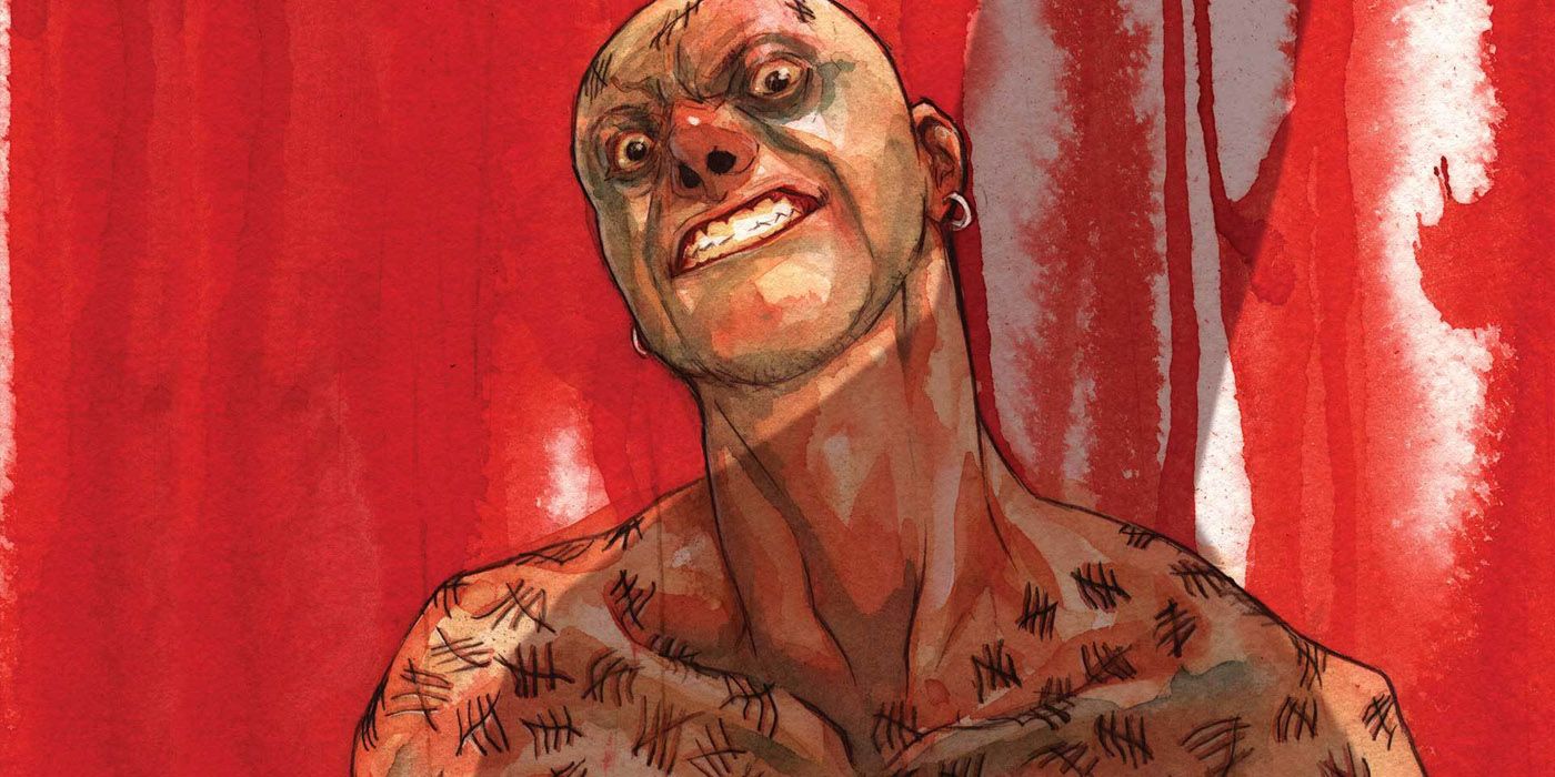 Victor Zsasz marking his body.