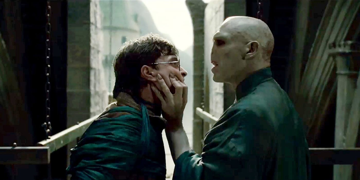 Voldemort and Harry fight atop Hogwarts