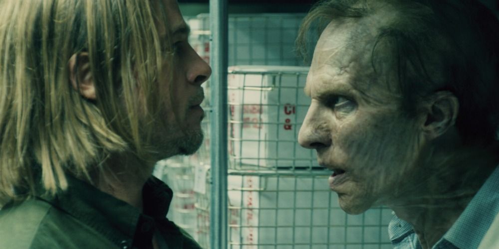 Gerry Lane face to face with a zombie in a science lab in World War Z