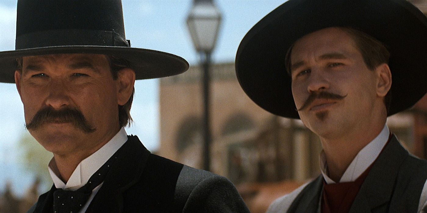 Wyatt Earp and Doc Holliday preparing for a showdown in Tombstone.